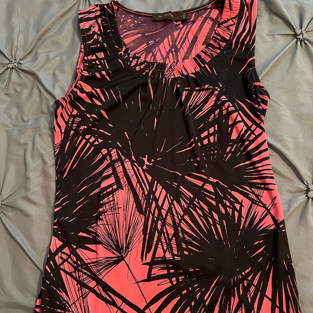 The Limited size Small top.  Orange & black design